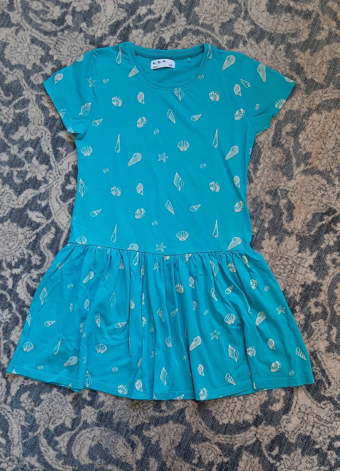 Niebieska letnia sukienka z morskim motywem r.128