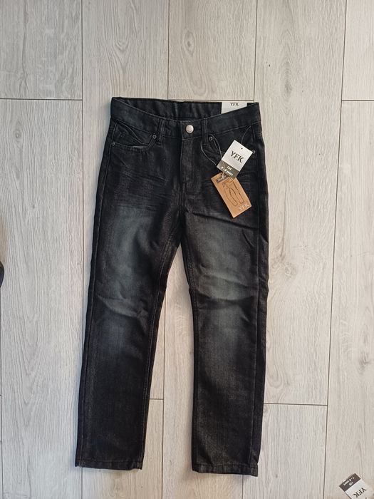 Nowe spodnie chłopięce r.134