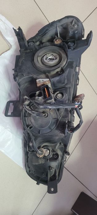 Фара передня ліва оригінал Lancer 2008 8301B259