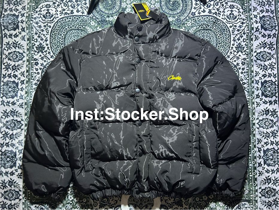 Пуховики Corteiz s