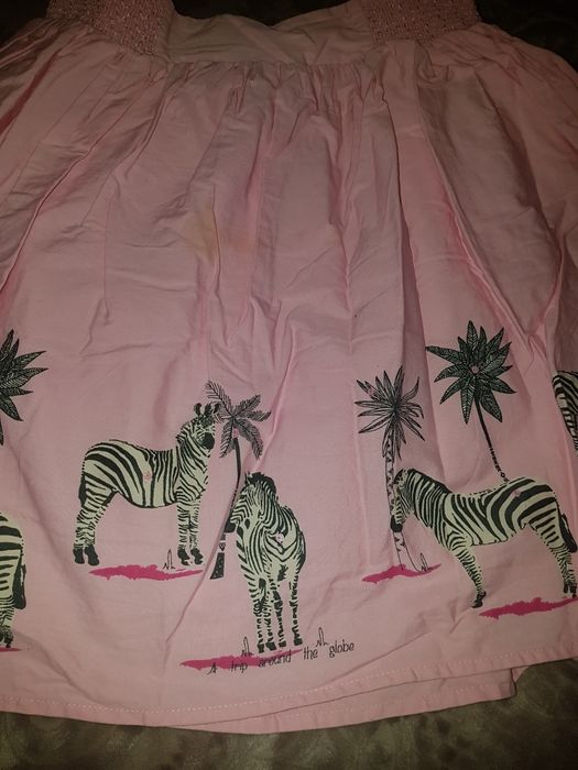 Rezerwac Różowa kloszowa spodnica dziewczęca w zebry 146-152