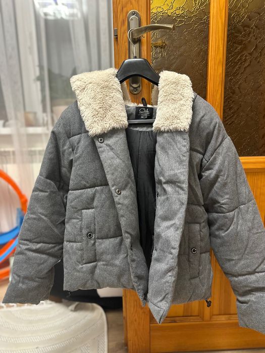 Курточка тепленька в ідеальному стані можна сказати нова