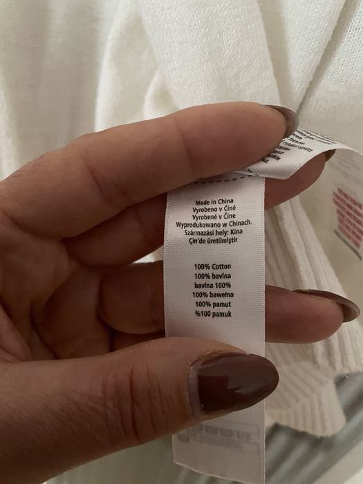 Sweter rozpinany biały
