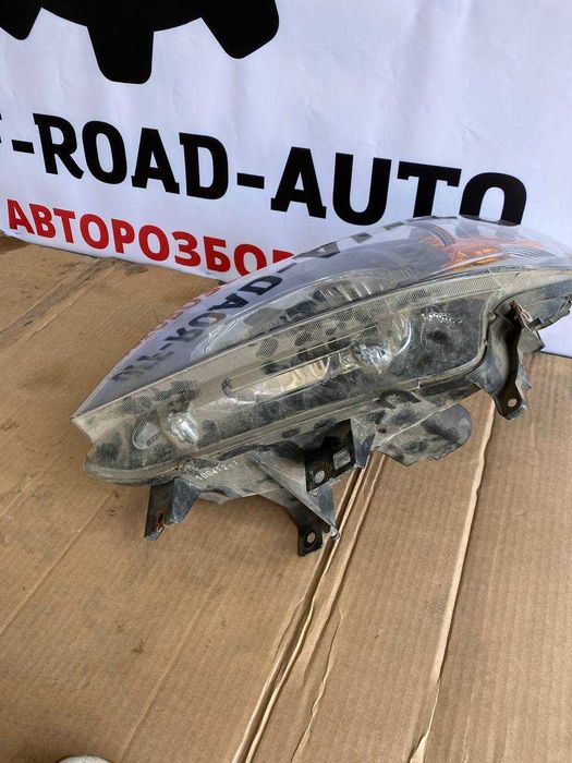Фара передня ліва оригінал FORD RANGER 2009-2012