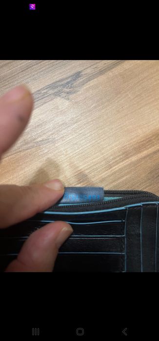 Porta cartões e moedas Piquadro.