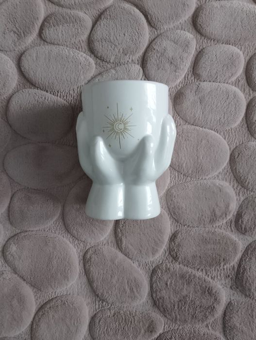 Dekoracja doniczka z astrologicznym motywem