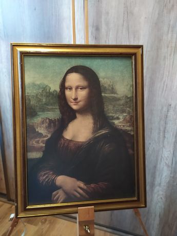 Mona Lisa w drewnianej ramie, reprodukcja.