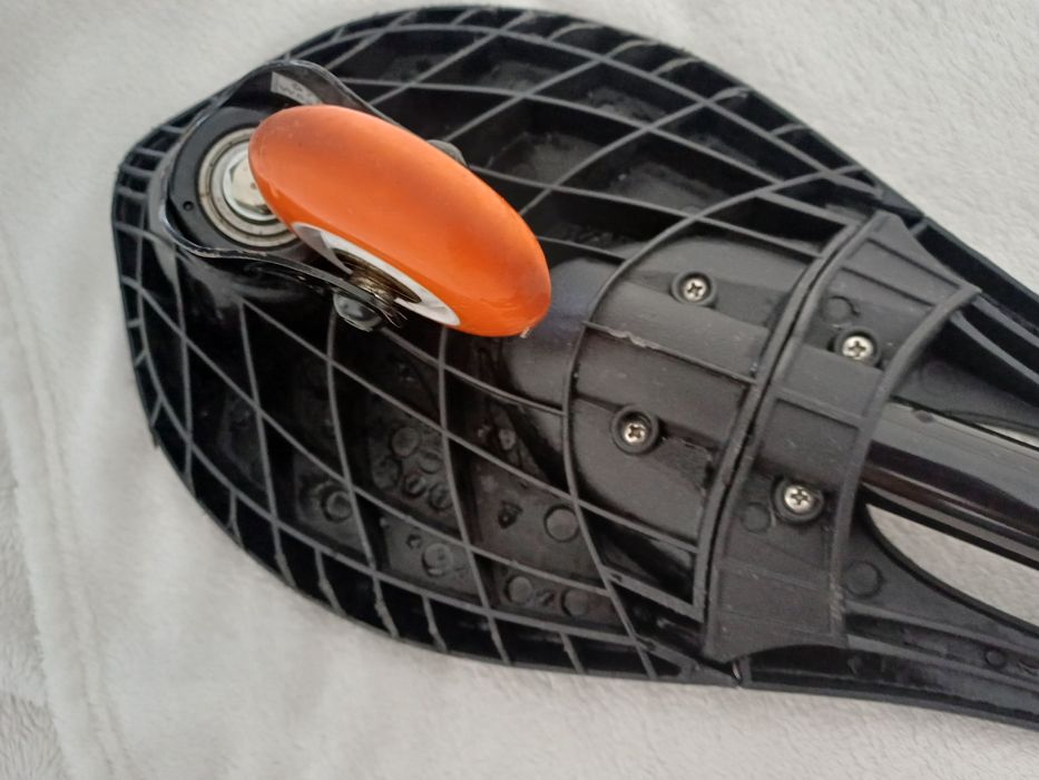 Deskorolka typu waveboard marki oxelo