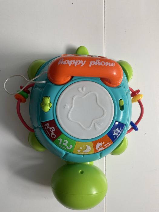 Розвіваюча, музична черепашка телефон. Має багато функцій.