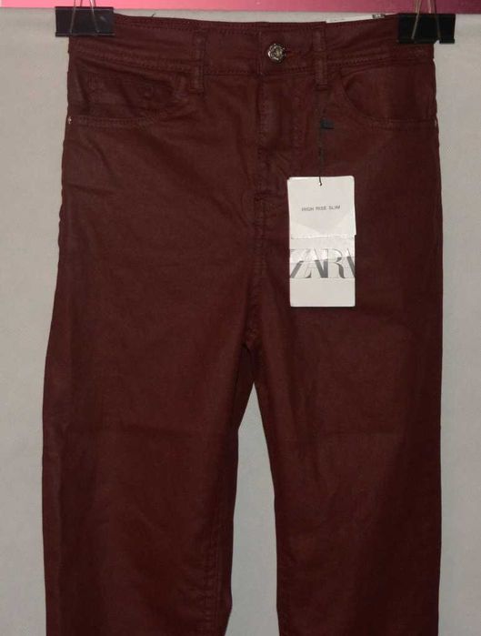 Woskowane jeansy Zara 34