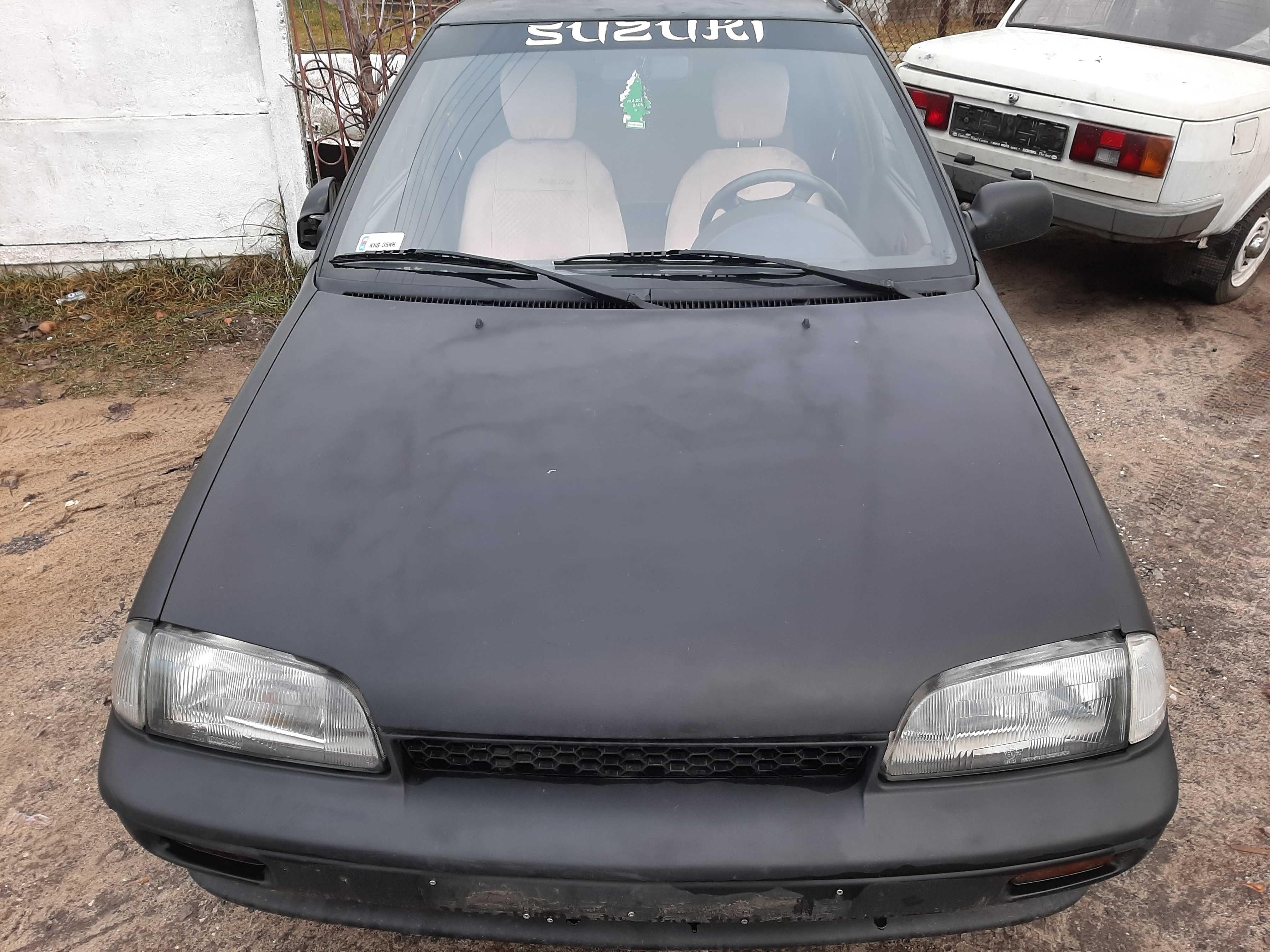 Suzuki Swift 1.0i 1996r.Maska przednia