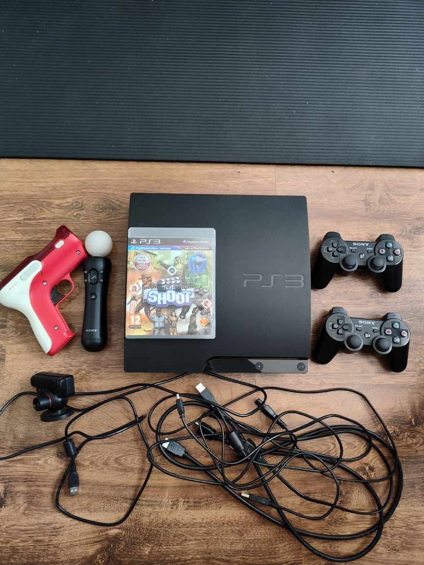 PS3 Slim 320GB, 2 pady SONY, Kontroler ruchu Move + Pistolet, kamerka