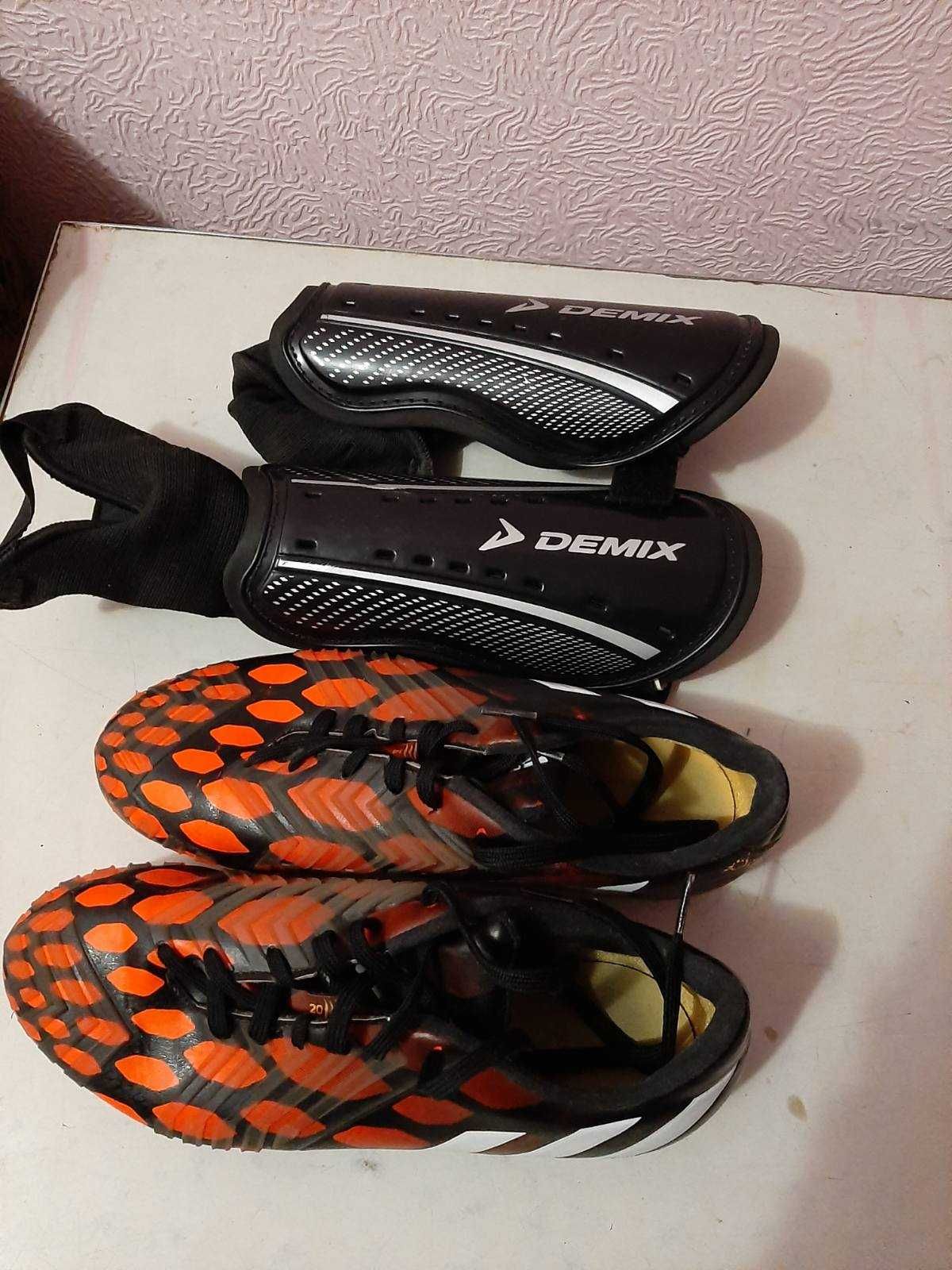 Футбольне взуття adidas і щитки б/у