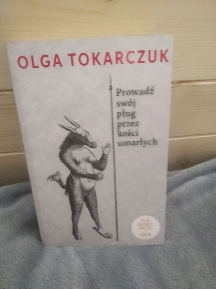 Olga Tokarczuk "Prowadź swój poług przez kości umarłych"