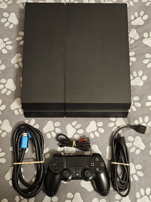 Consola PS4 + Comando.