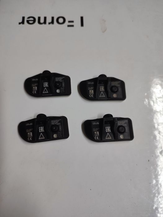 Czujnik TMPS Ford JX7T-1A180-CA oryginalny 4 szt