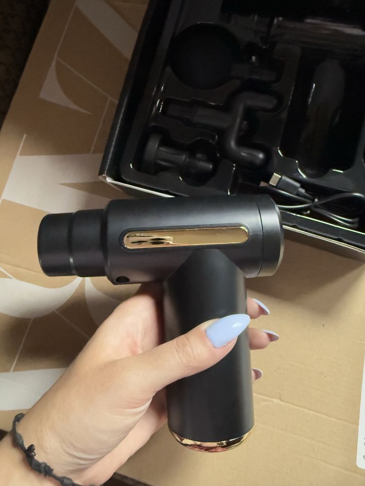 Pistola de massagem nova