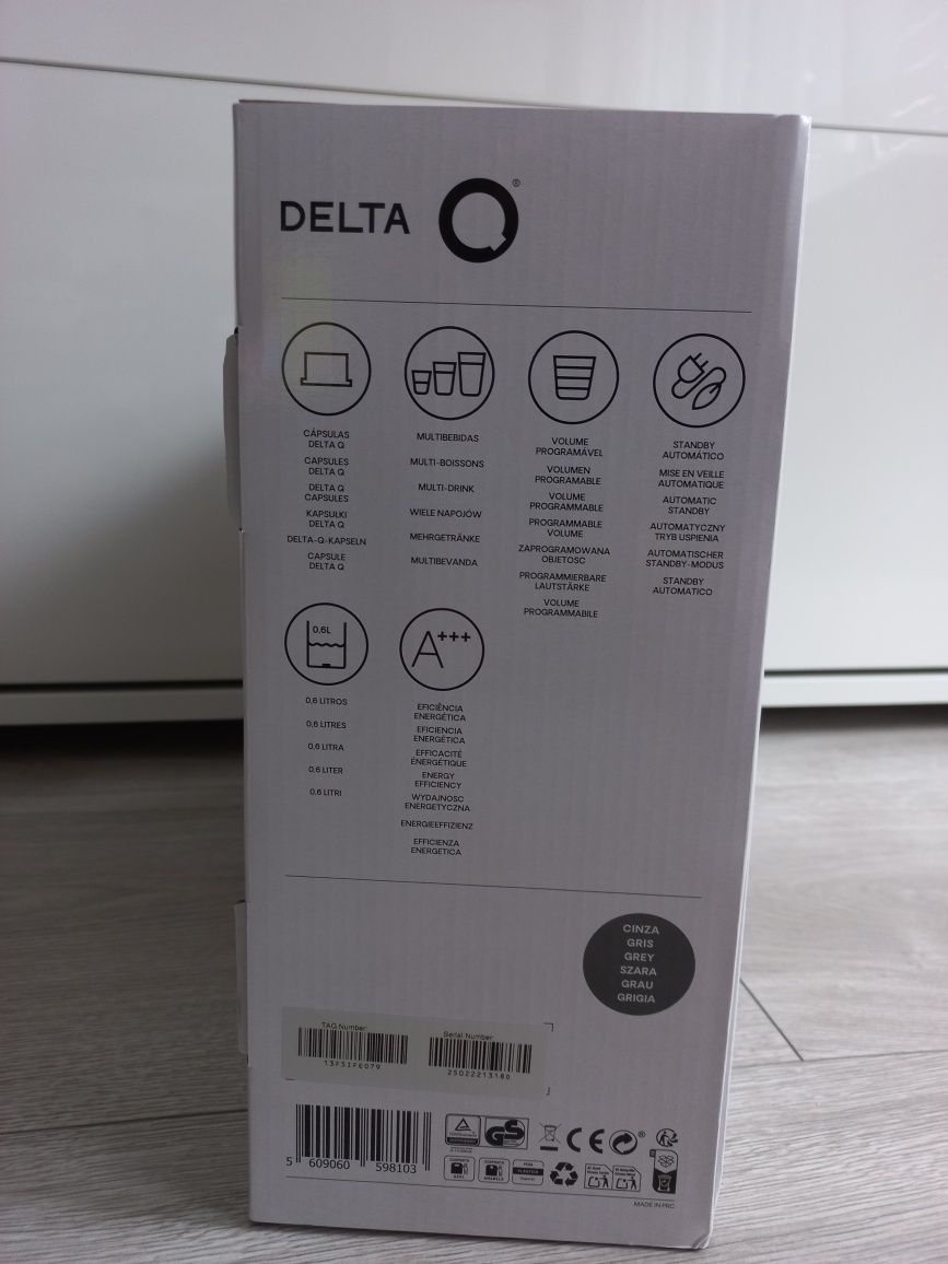 NOWY Delta mini QOOL Ekspres do kawy kapsułkowy podróżny kawa espresso