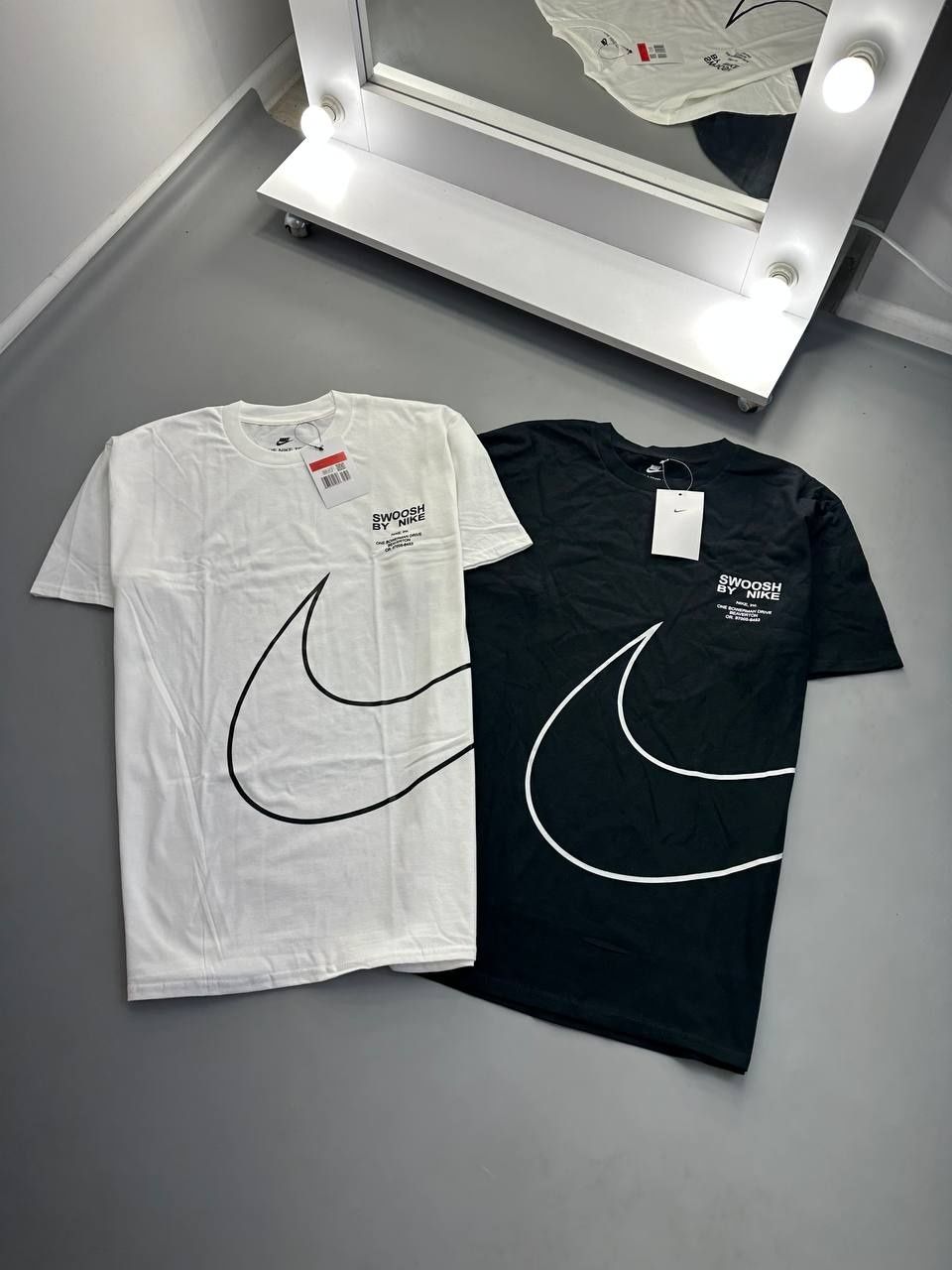 Футболки Nike Swoosh