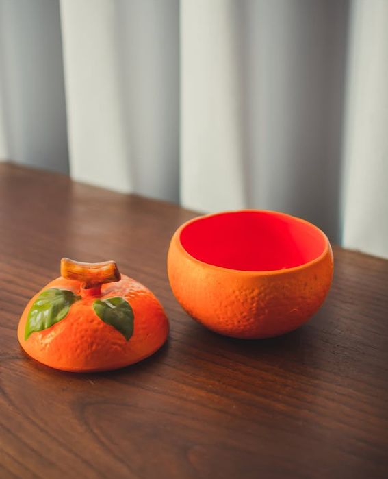 Pote laranja em ceramica