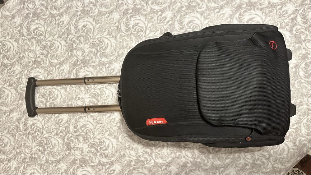 Mochila trolei equipamento foto