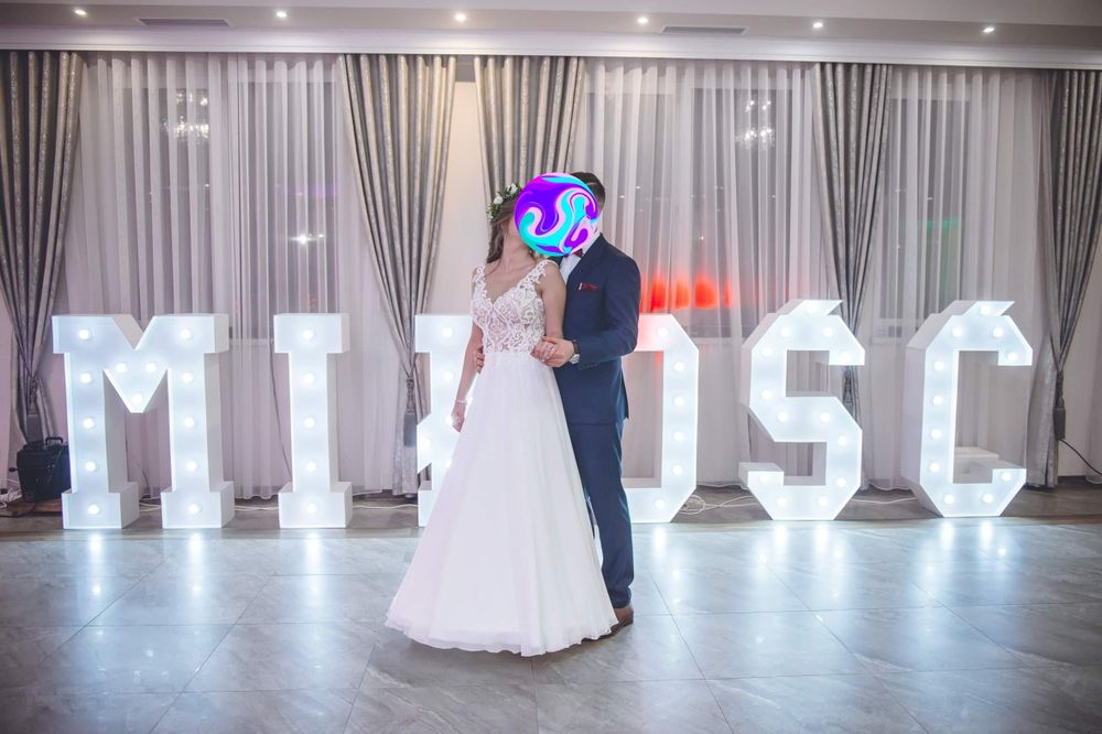 Suknia ślubna , kolor śmietankowy, ivory, koronka