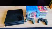 PS4 PRO 1TB + 2 pady + 23 gry