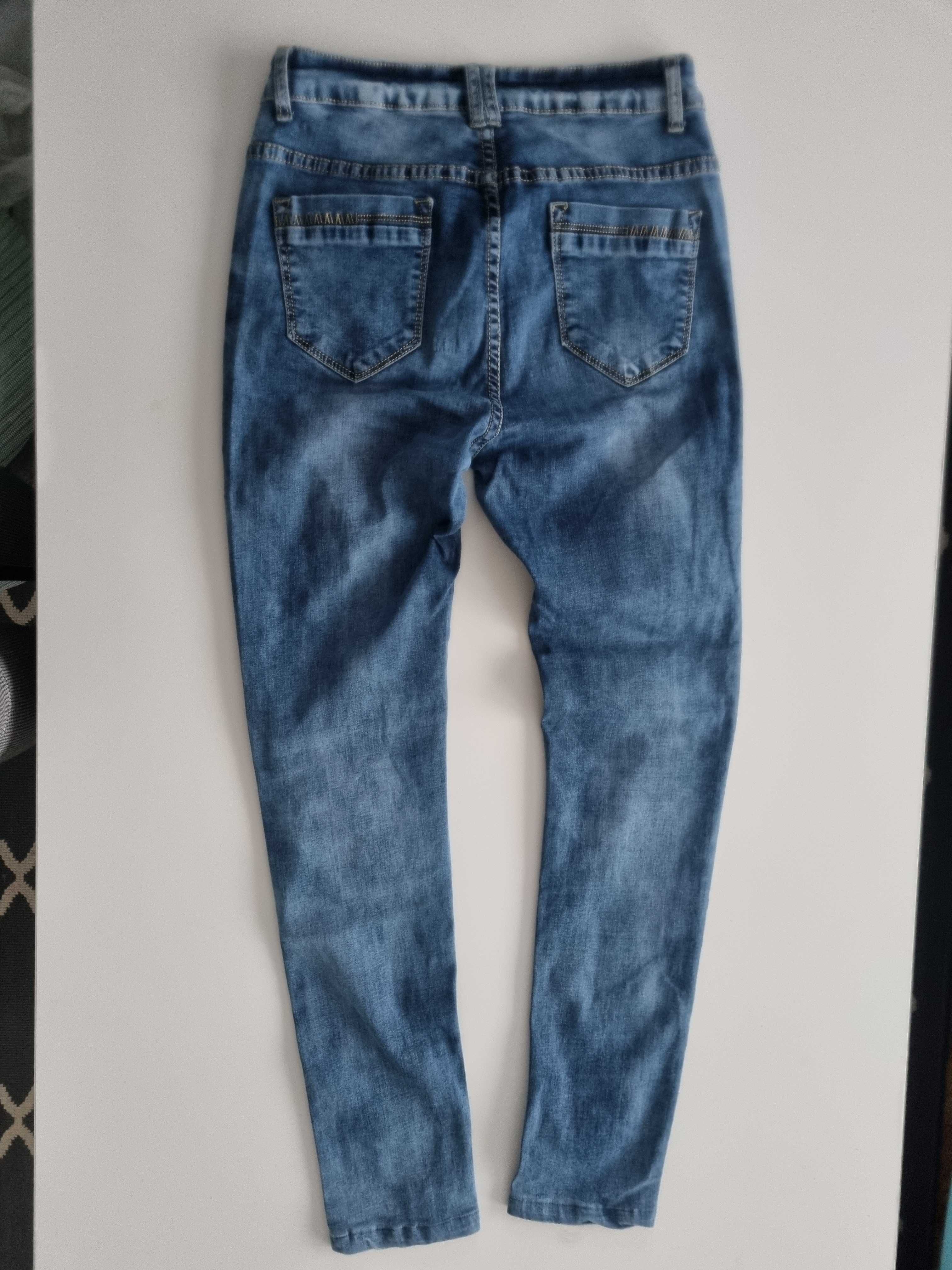 spodnie rurki jeansy r. 36(S) wycierane