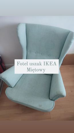 Miętowy fotel uszak IKEA Strandmon