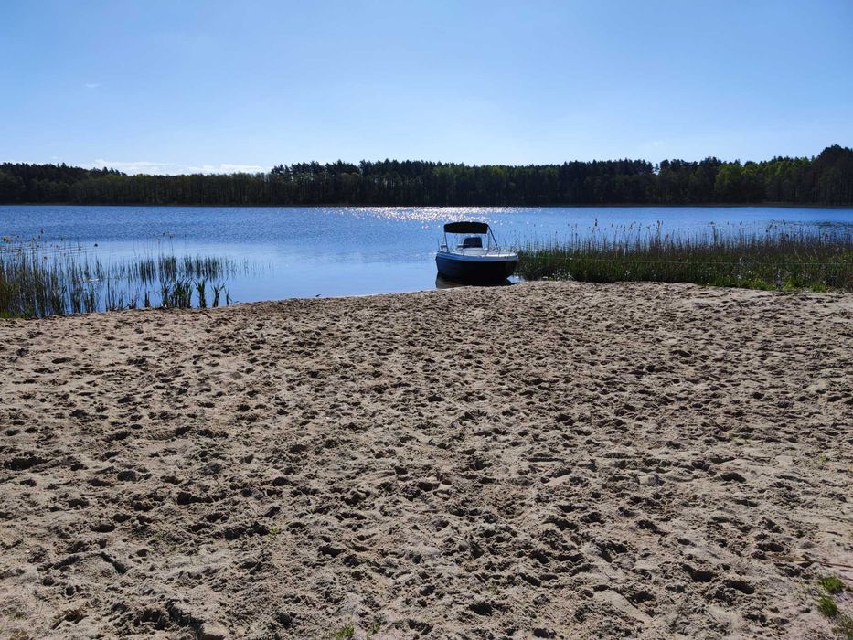 Domek na urodziny nad jeziorem sauna jacuzzi Warmia Mazury plaża