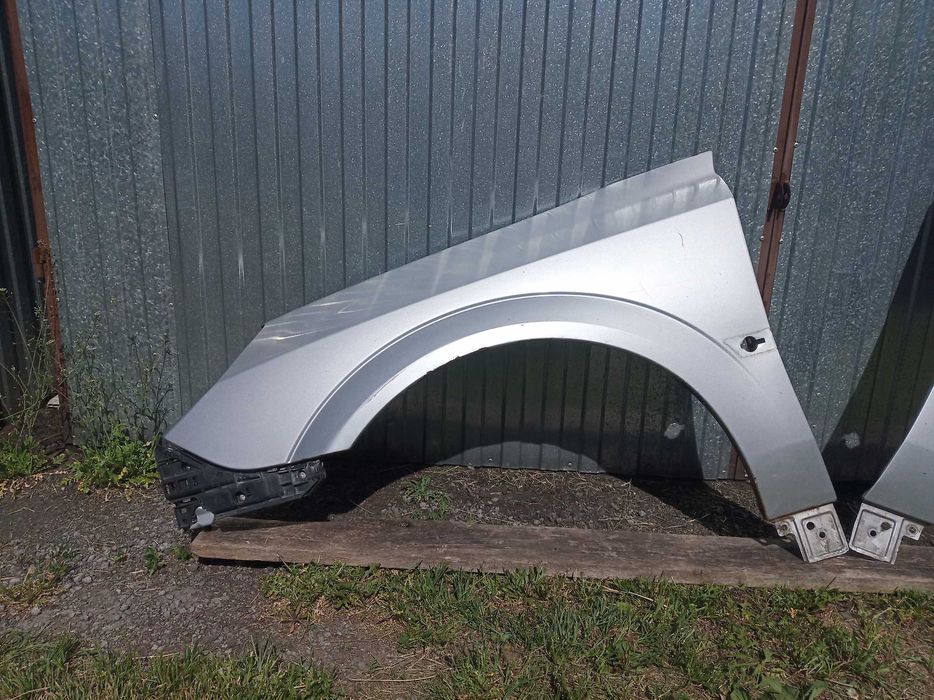 Opel vectra C LIFT Błotnik prawy przód L.P. srebrny Z157