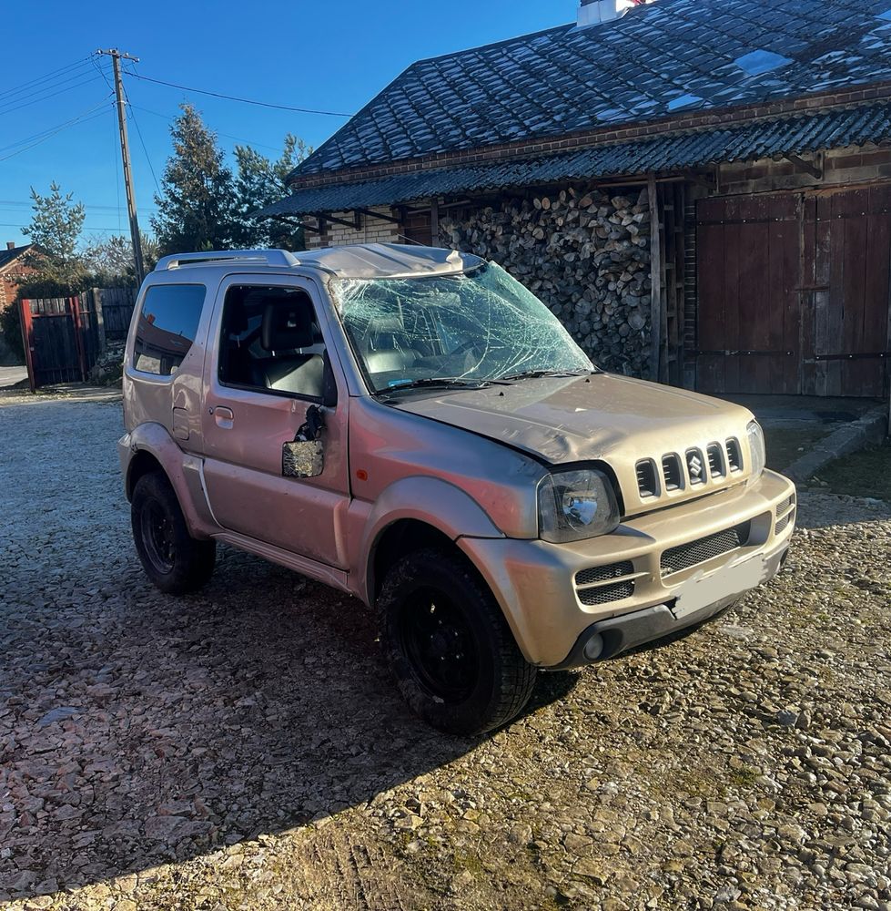 Suzuki Jimny 1.3 części zderzaki klapa środek silnik napęd reduktor