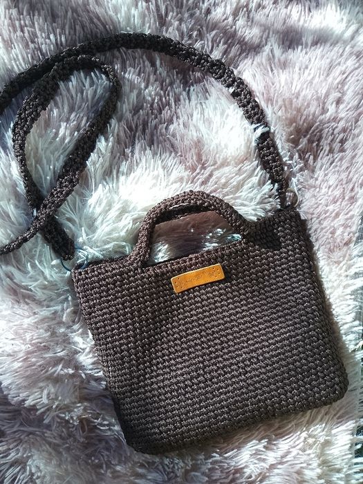 Нова коричнева на кнопці