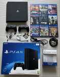 PS4 Pro 1TB + 2 pady + 9 gier + pełne okablowanie