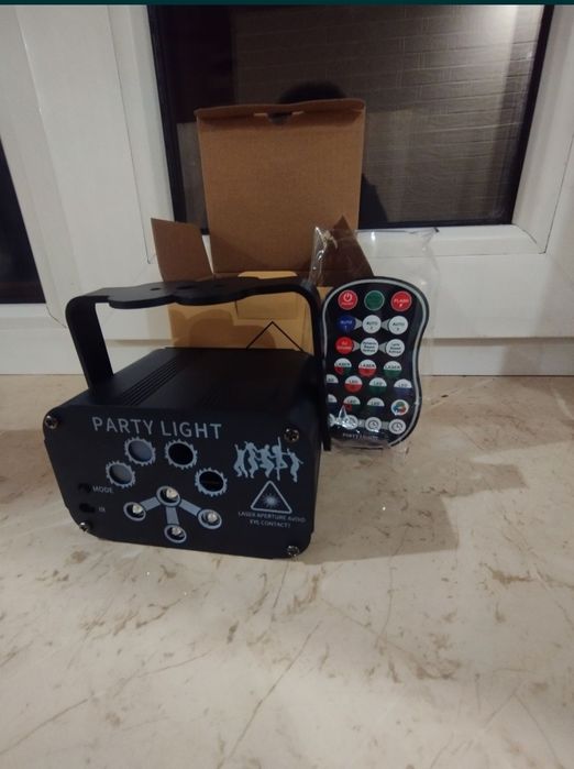 Світломузика, лазерний проектор