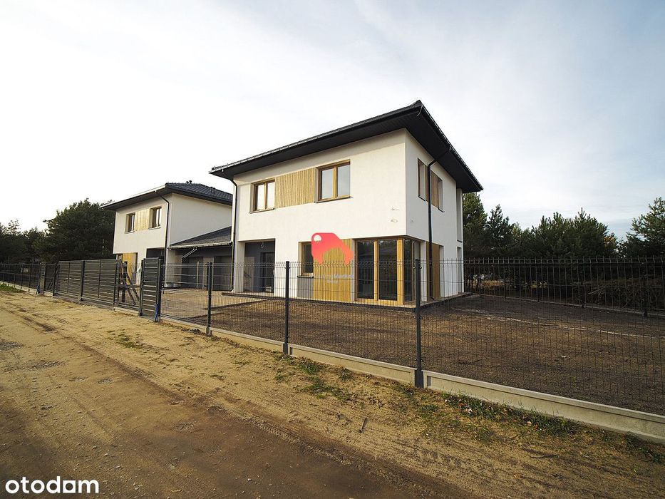 Nowoczesny bliźniak z dużym ogrodem, pompa ciepła