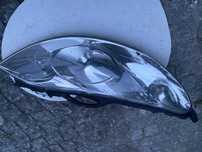 Farol peugeot 207 com arranhão