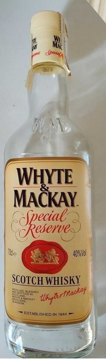 Garrafa Whyte & Mackay de 70 cl e com selo