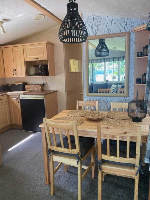 Domek nad jeziorem Ublik Wyszowate linia brzegowa pomost łódka