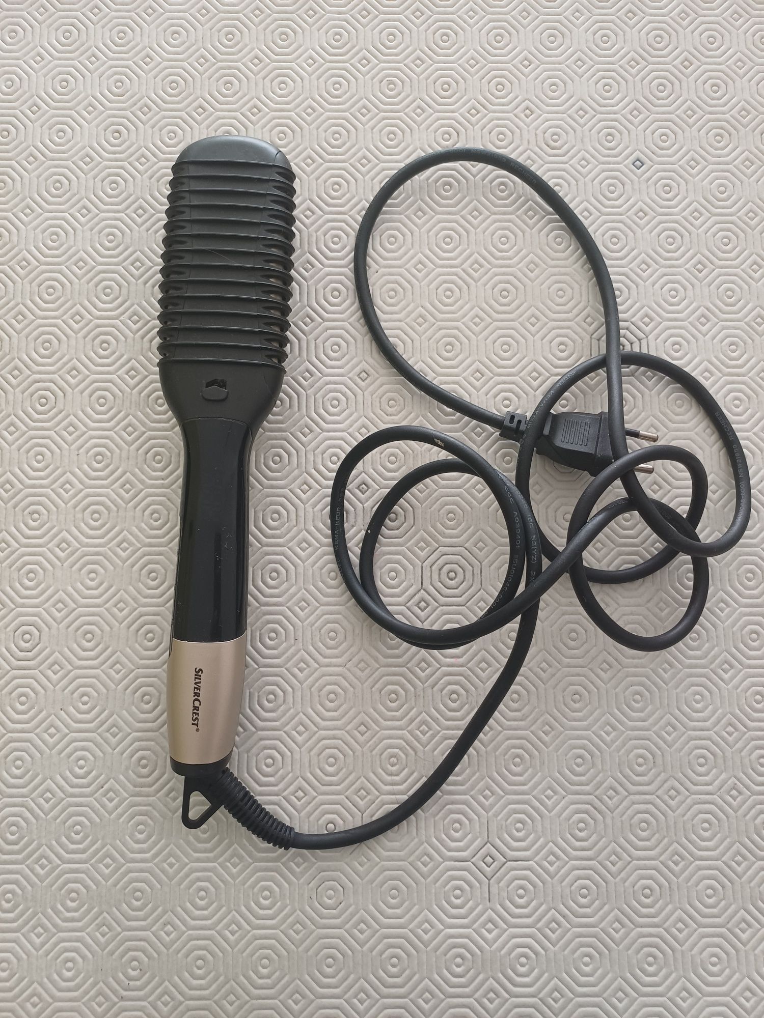 Escova de cabelo eléctrica