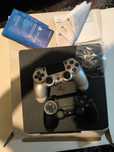 Ps4 1Tb com caixa 2 comandos 15 jogos