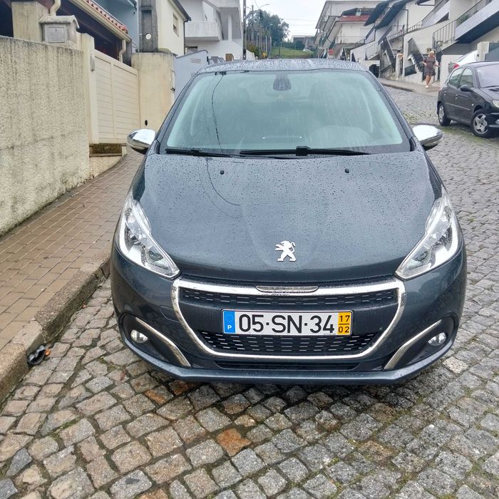 Peugeot 208 blue HDI style carro de garagem