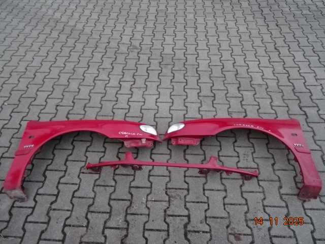 Toyota Corolla E11 Błotnik Prawy Lewy Nosek Listwa Pod Lampe Ochronna