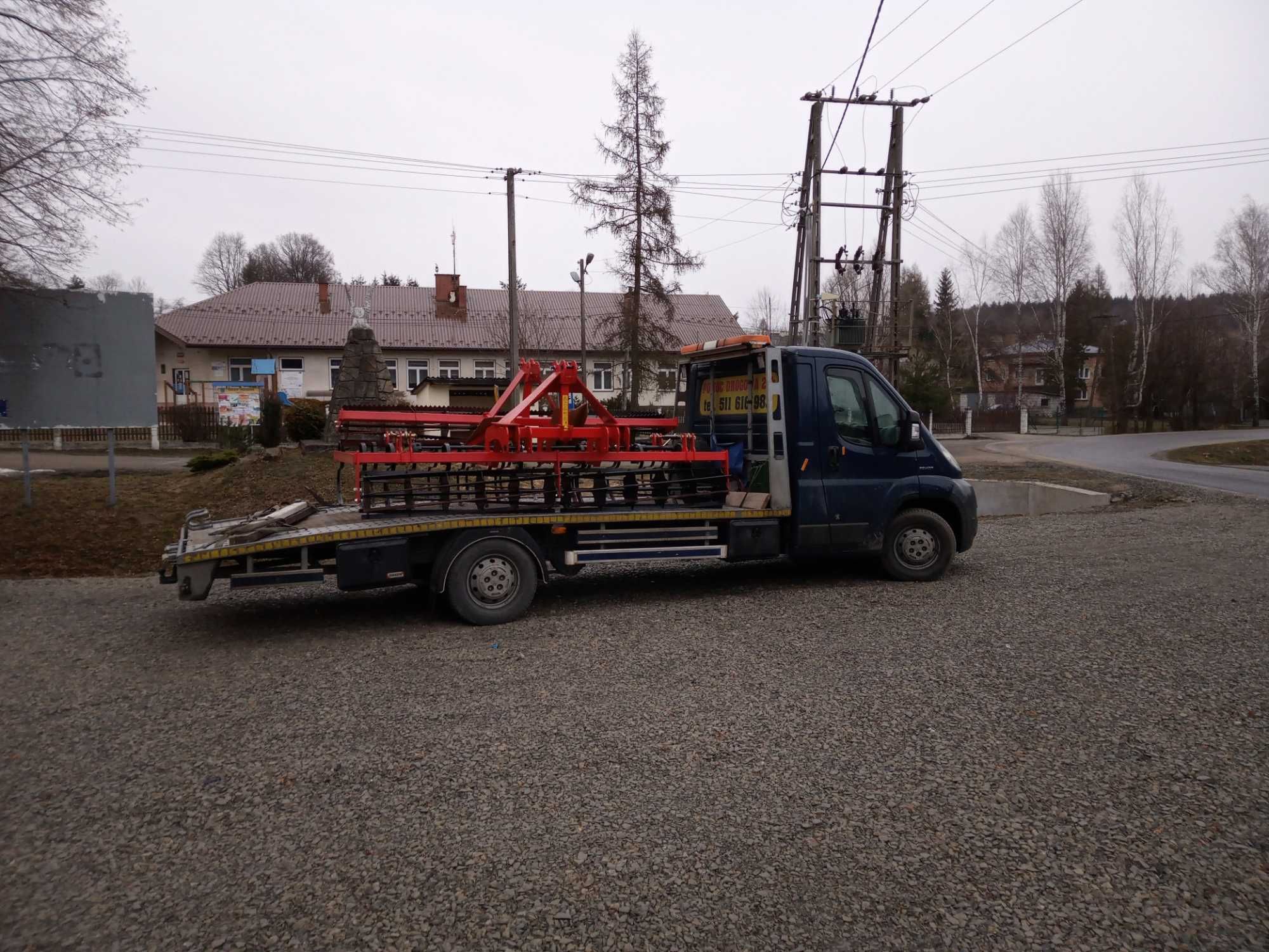 pomoc drogowa laweta auto pomoc holowanie