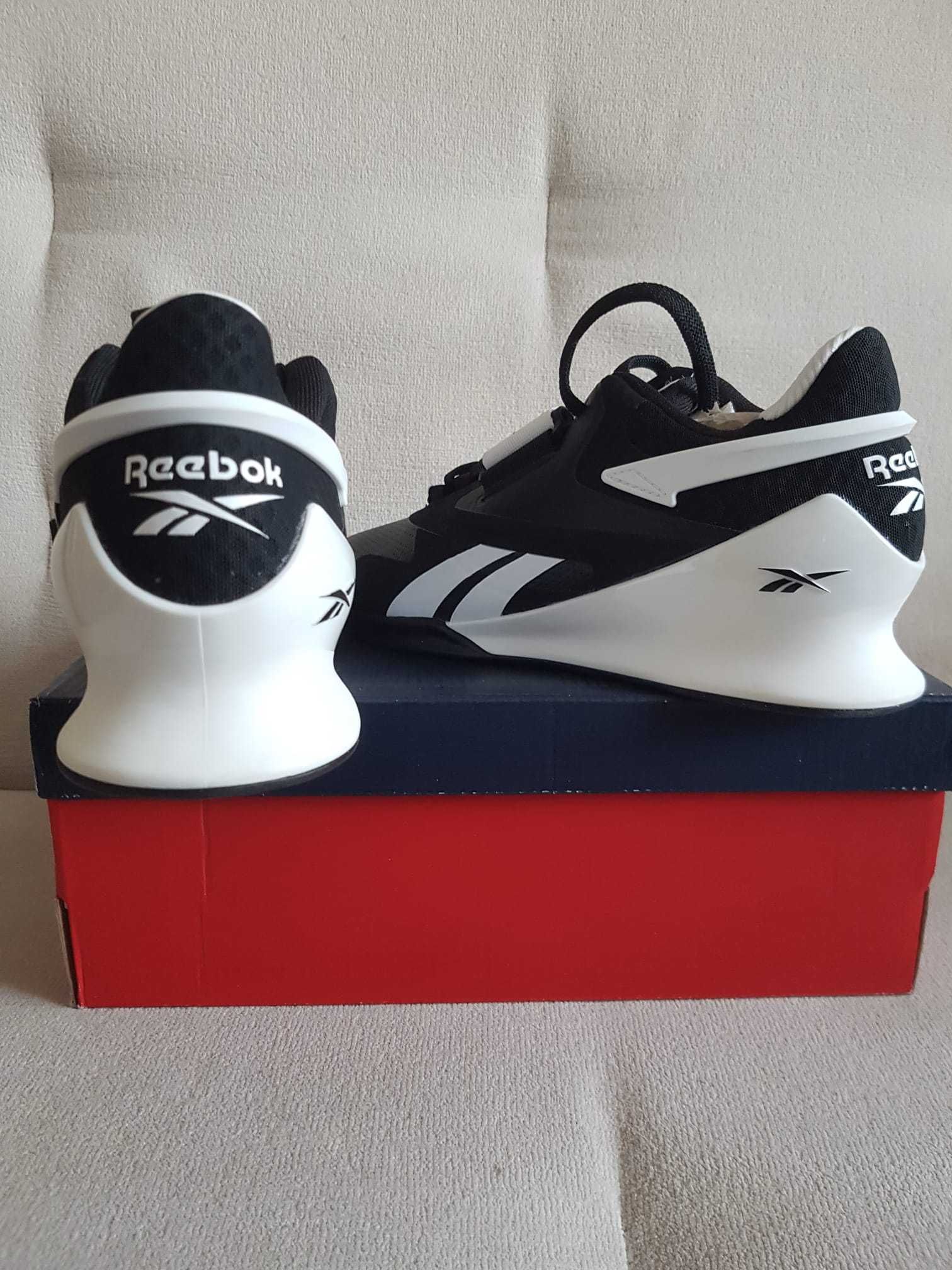 Buty damskie sportowe na koturnie Reebok.