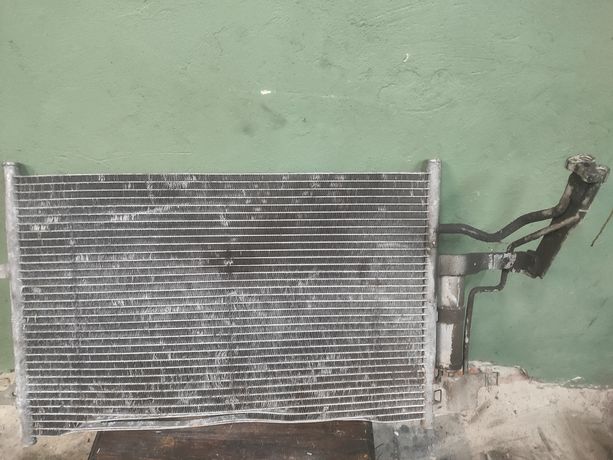 Радиатор кондиционера Киа Черато