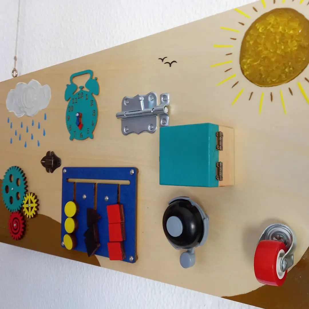 Busyboard painel sensorial Montessori