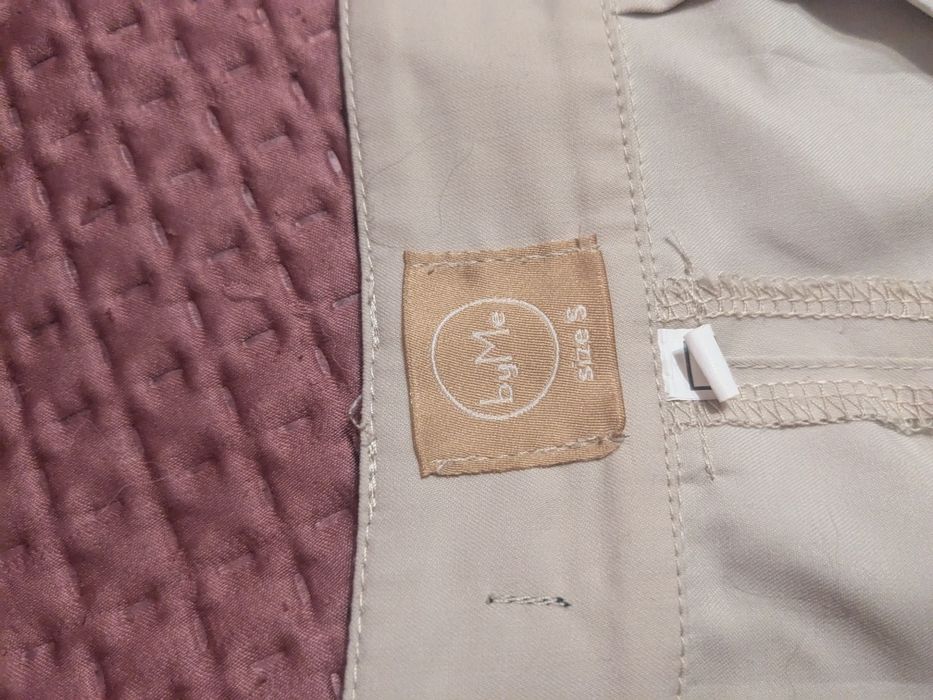 Брюки бежевого кольору