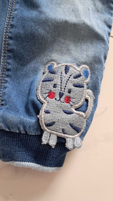 Spodnie niemowlęce ala jeansowe miękkie materiałowe regulowane Name It