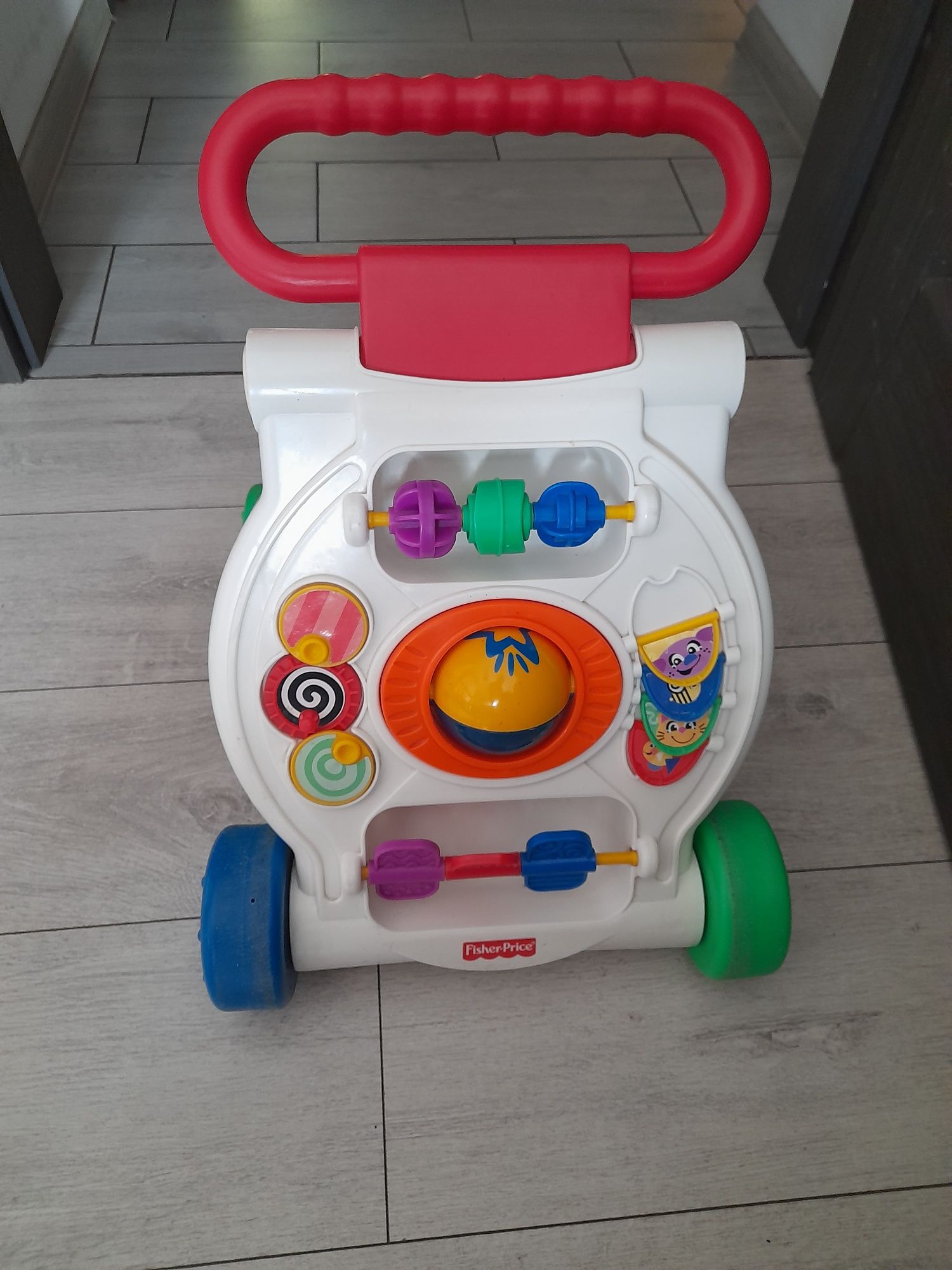 Pchacz jeździk Fisher Price